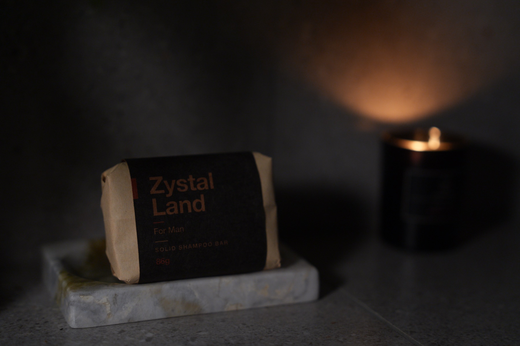 Shampoo bar in a candlelit bathroom