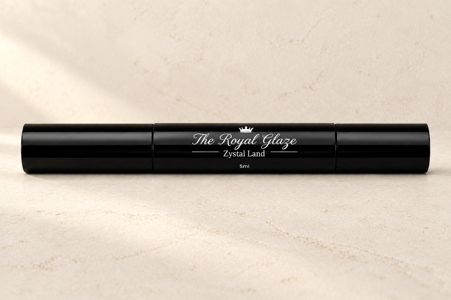 The Royal Glaze black 5ml tube on a warm ivory surface